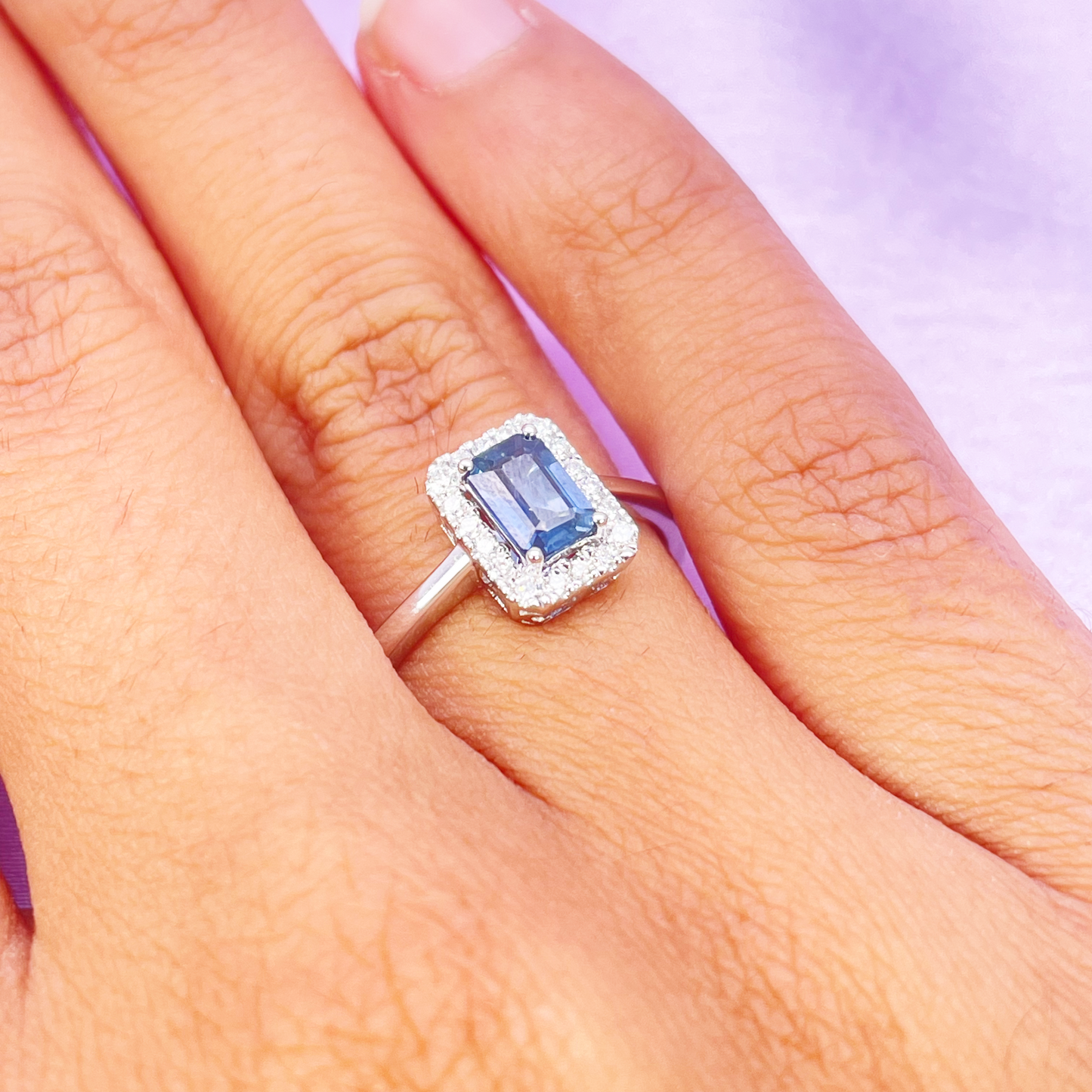 18ct White Gold Emerald Cut Blue Sapphire & Diamond Halo Ring 0.79ct